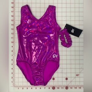 NWT V-Neck Mystique Tank Leotard 
Magenta Opalescence / CM (child medium)